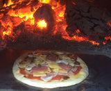 Even in a wood fired outdoor oven, the steel slab  makes for a superior pizza bake! The steel surface is easier to quickly brush clean of ash and fire debris before you slide the pizza in.